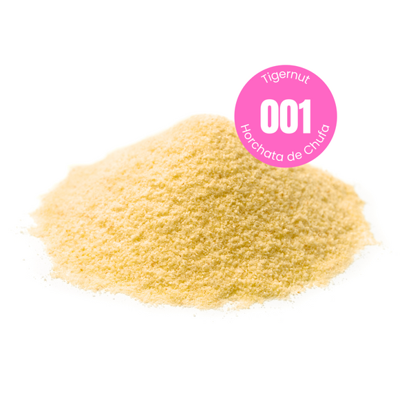 Product shot of a sweetened plant based milk powder.  A mound of a golden-beige powder with a pink circular sticker label overlay with the recipe number 001 in the centre with the words Tigernut and Horchata de Chufa indicating the main ingredient of the powder.