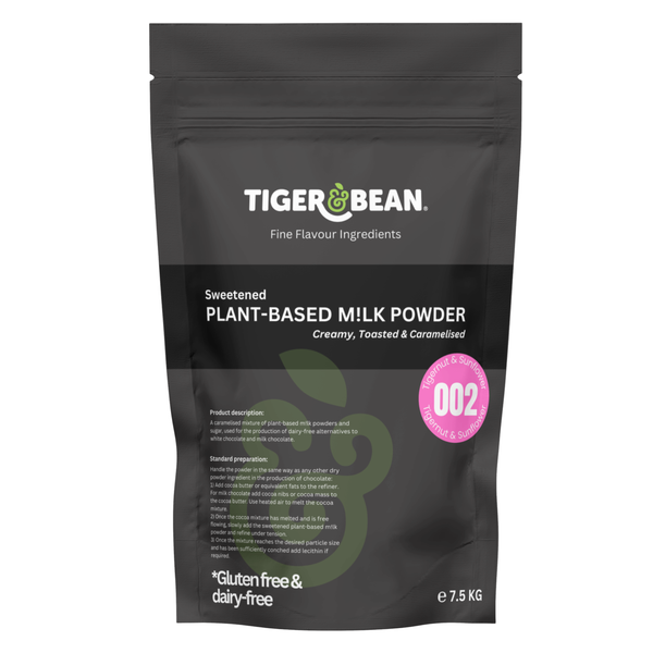 A black pouch of sweetened plant-based milk powder weighing 7.5kg. Packaging states it is gluten-free and dairy-free and is used in the production of dairy-free alternatives to milk chocolate and white chocolate. A pink sticker states that it is recipe number 002 made with tigernut and sunflower.