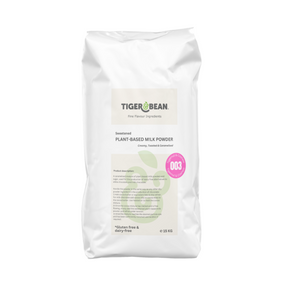 A white sack of sweetened plant-based milk powder weighing 15 kg. Packaging states it is gluten-free and dairy-free and is used in the production of dairy-free alternatives to milk chocolate and white chocolate. A pink sticker states that it is recipe number 003 made sweetened tiger nut and cashew milk.